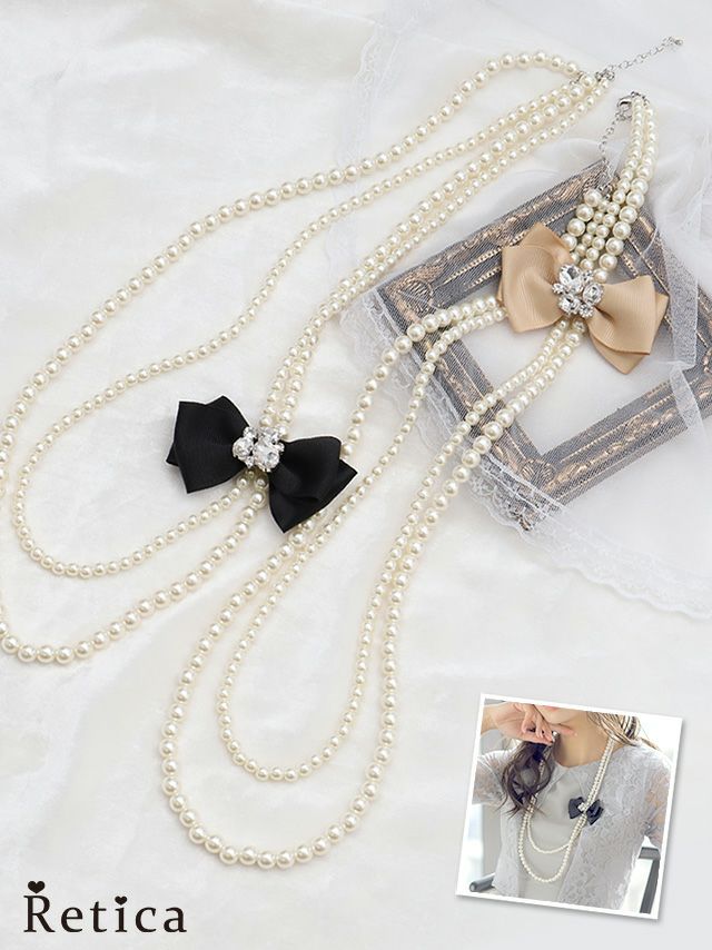 ビジューリボン付きパール２連ロングネックレス